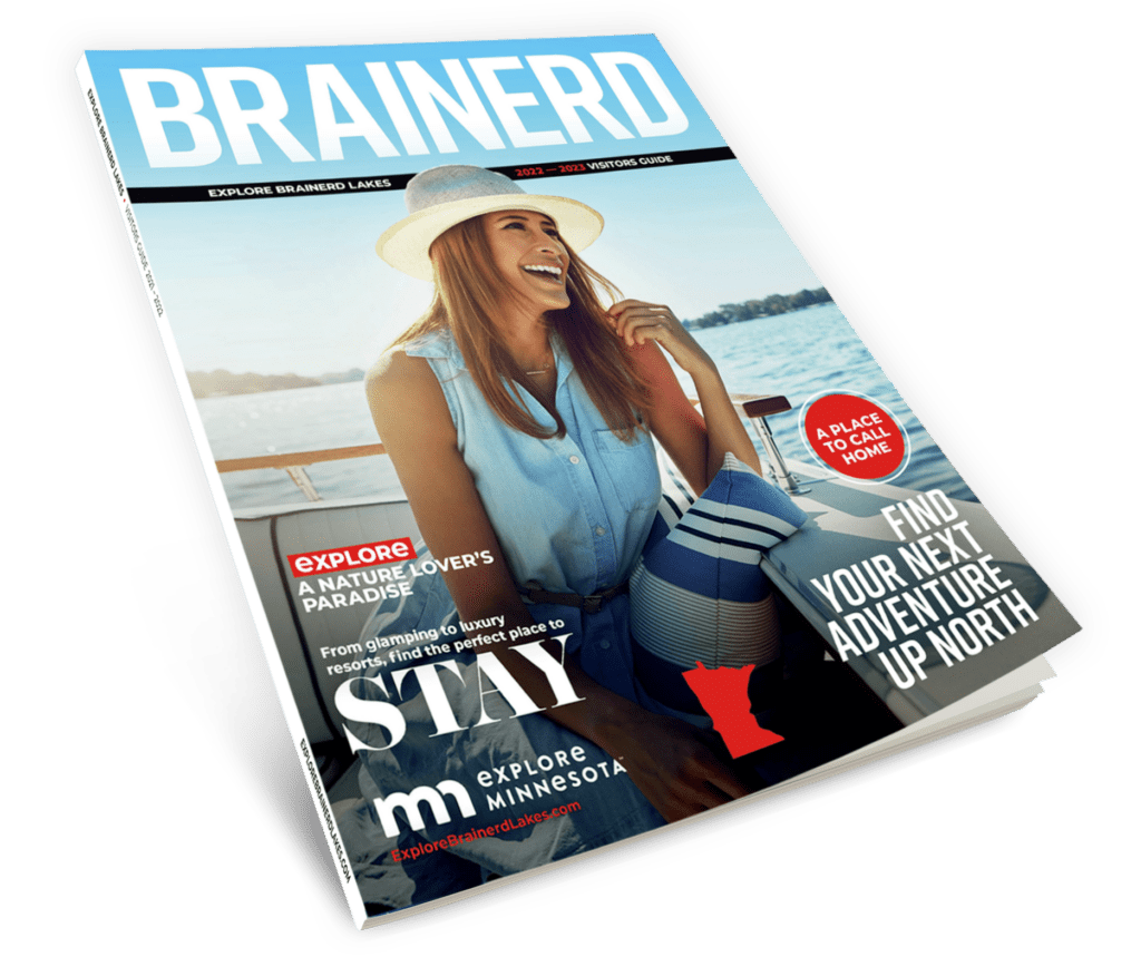 Explore Brainerd Lakes Visitor Guide Magazine showing Cover of woman on boat