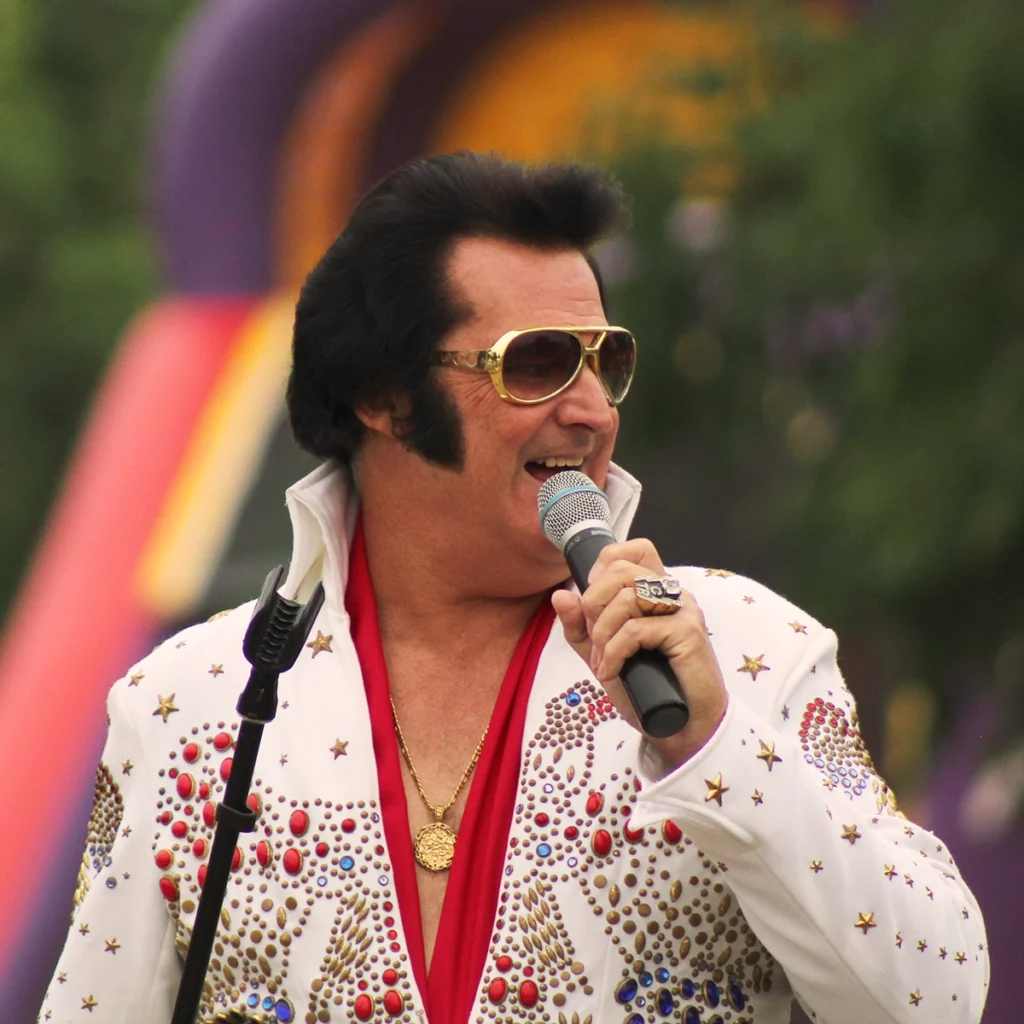 Photo of Bean Hole Days showing an Elvis impersonator singing into a microphone