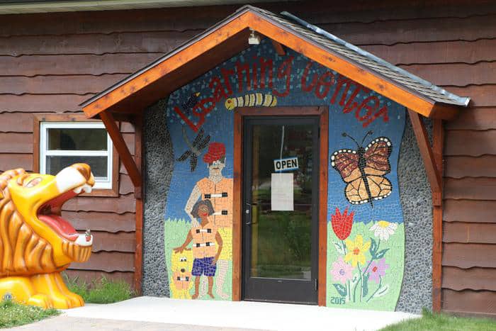 Photo of the interprative learning center entrance with a mosaic at the Crosslake Recreation Area