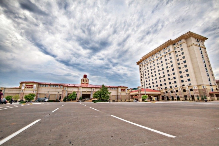 Photo of Grand Casino Hotel and Resort showing large building on a cloudy summer day