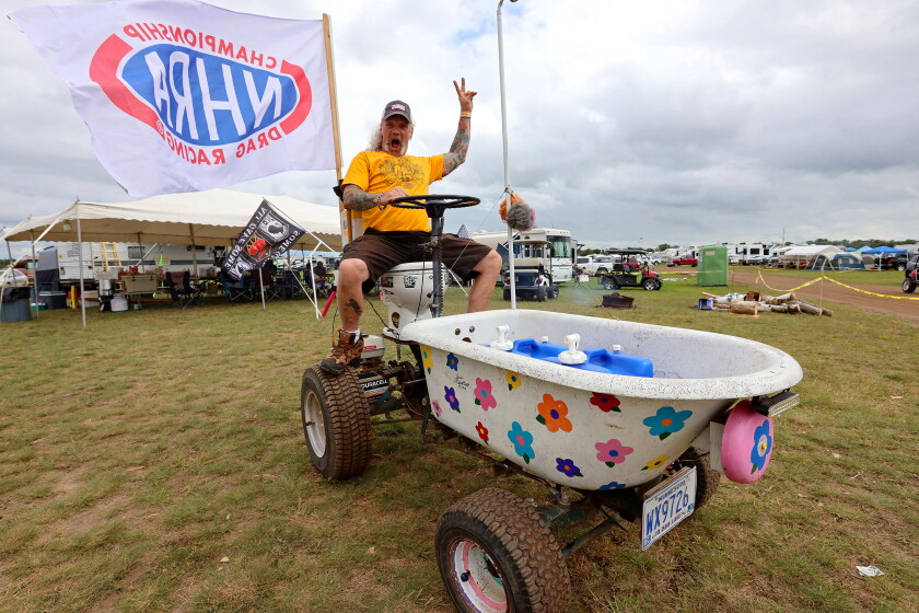 Mark Headla, right, driving around The Zoo at Lucas Oil NHRA Nationals on Thursday, Aug. 15, 2024, at Brainerd International Raceway. Kelly Humphrey Brainerd Dispatch