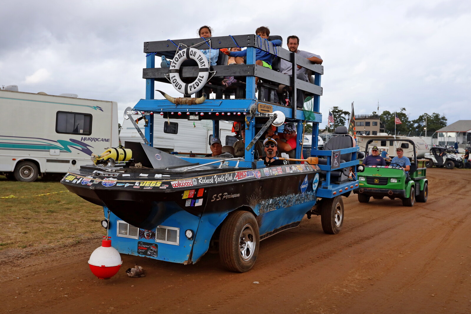 The Redneck Yacht Club drives around the camping area at the Lucas Oil NHRA Nationals on Thursday, Aug. 15, 2024, at Brainerd International Raceway. Kelly Humphrey Brainerd Dispatch